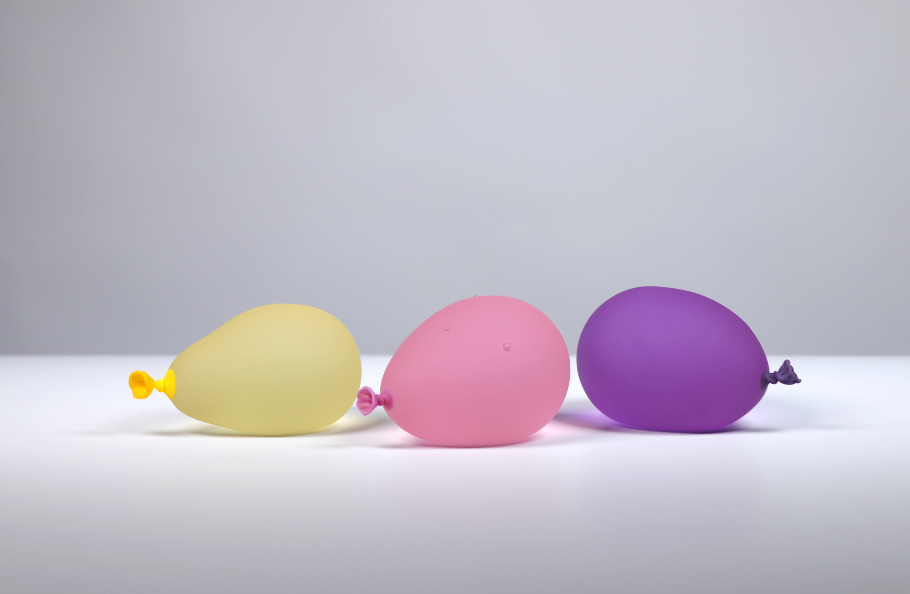 Water Balloon Trio 4 - Pink w/ droplets, Yellow, Dark Purple
