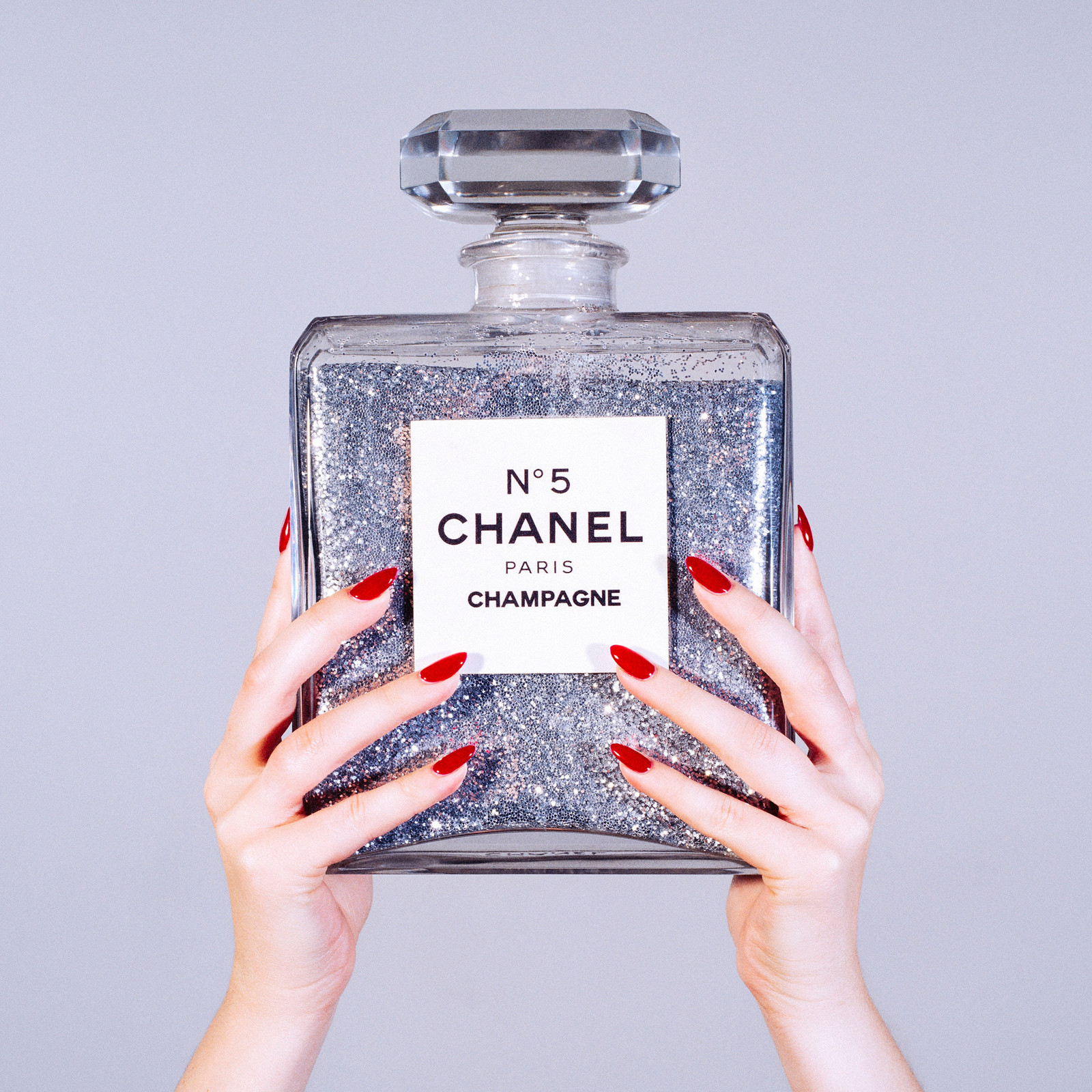 Champagne Chanel Hands