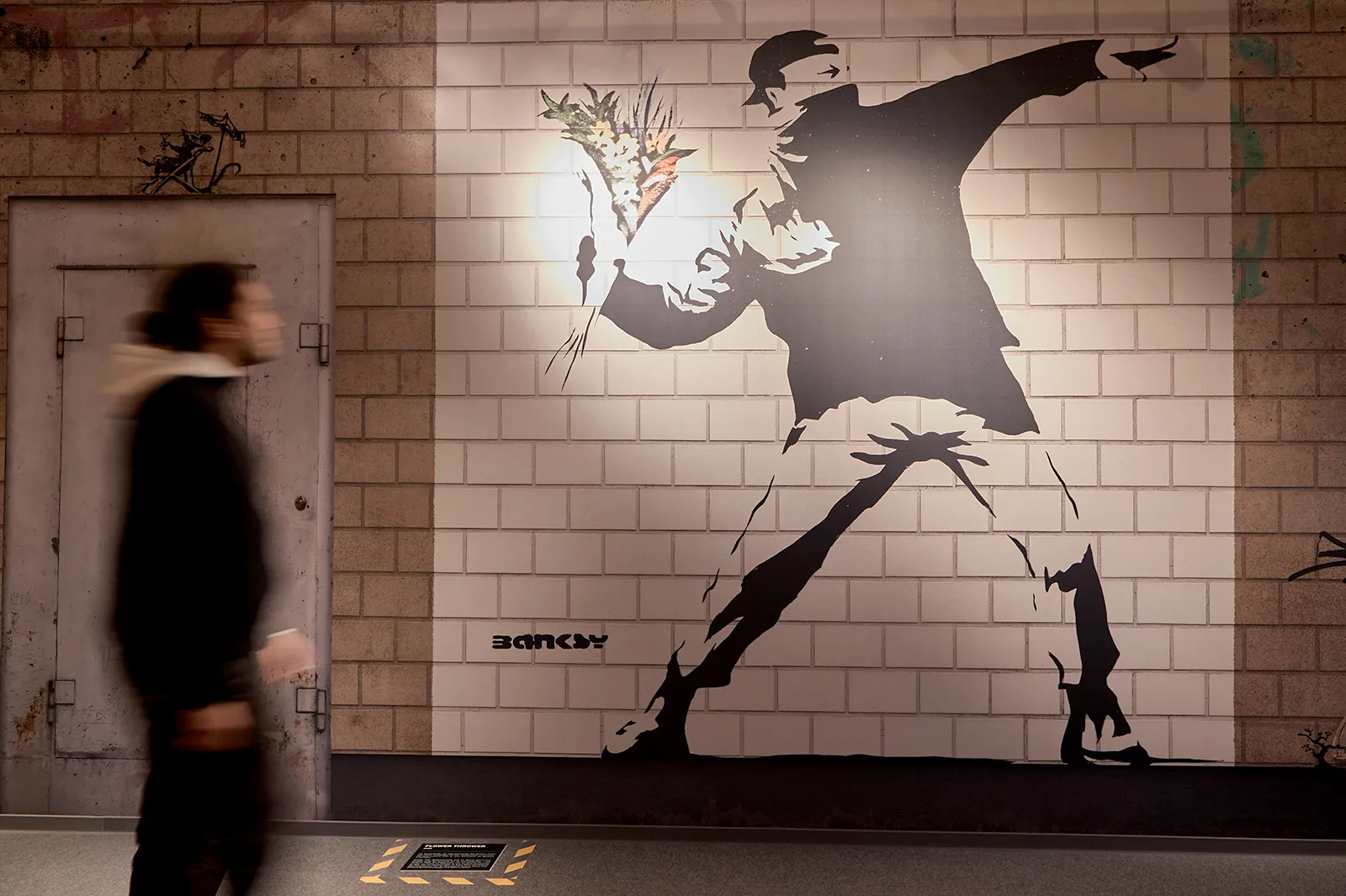 Banksy, Flower Thrower Wall. Available at Guy Hepner, New York.