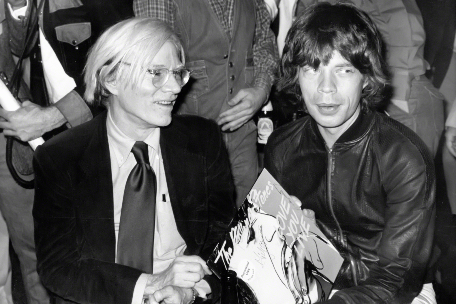 CIRCA 1977: Andy Warhol and Mick Jagger at the album release party for 'Love You Live.' Robin Platzer/Images/Getty Images